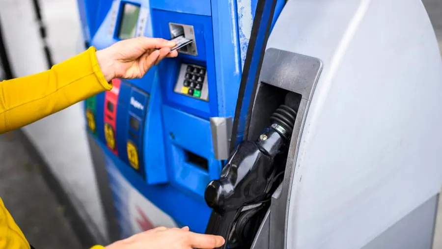 Illustration of a modern fuel station with digital price board